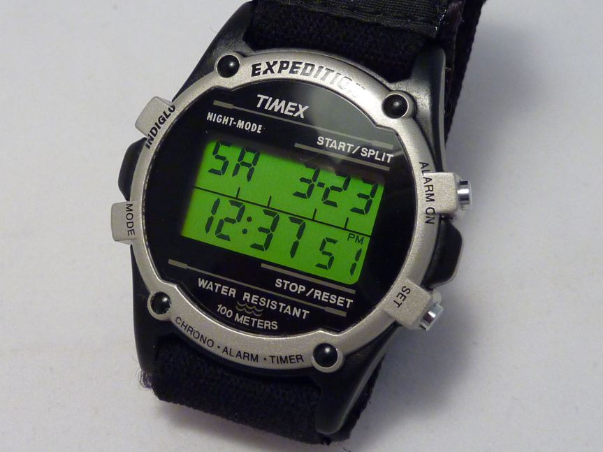 Timex digital display in reflecting light - gives fluorescent contrast