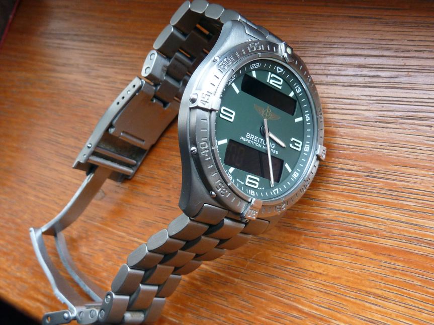 Titanium at it's best case and solid link (diver extendable) bracelet.