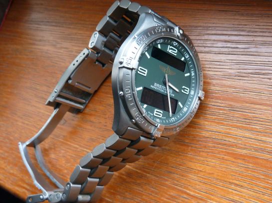 Titanium at it's best case and solid link (diver extendable) bracelet.