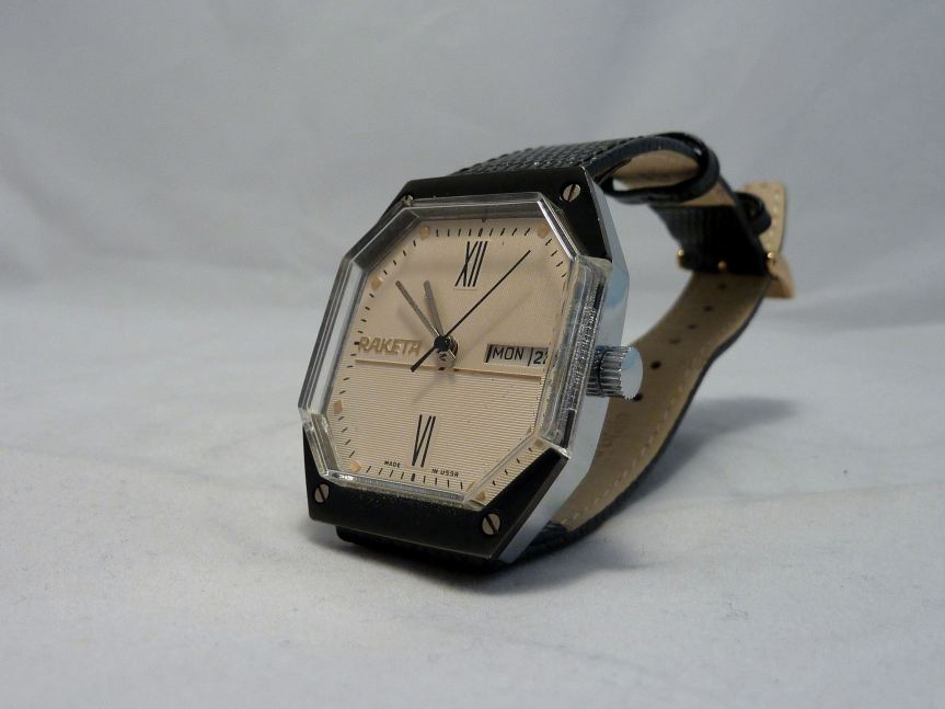 Unusual textured face and octagonal case, Day and Date watch.