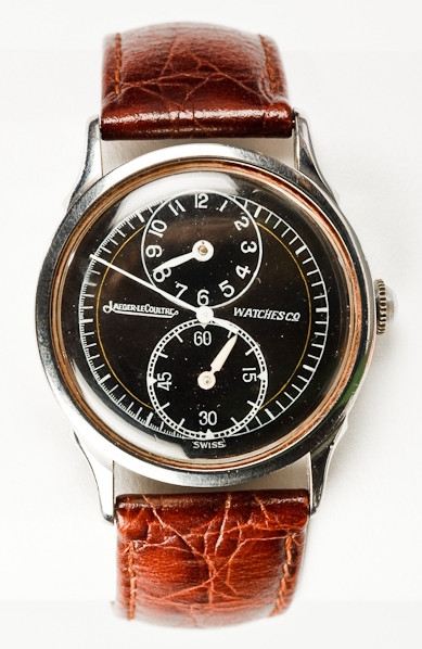 Listed as Jaeger Le Coultre, black dial Gents.