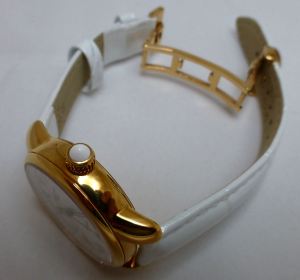 Quality leather strap in white with deployment closure.