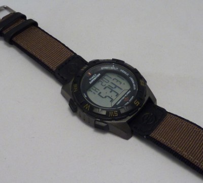 Older model T Vibration Alarm - Note standard strap & lugs.