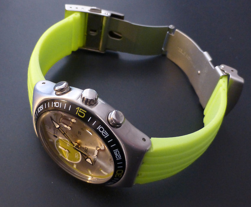 Inclusive twin pushbutton silicon steel deployment to Swatch fitting with lock