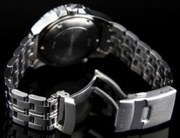 Screwed Stainless Steel back , 300m Water Resistance and decent bracelet, shows quality.