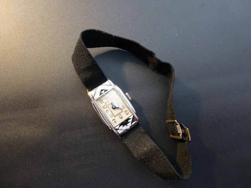 Original strap and slide clasp.