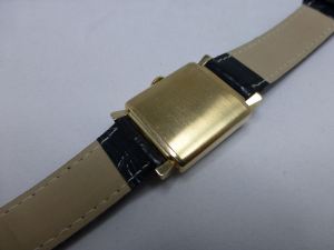 Neat brushed gold finish with fancy lugs - classic.